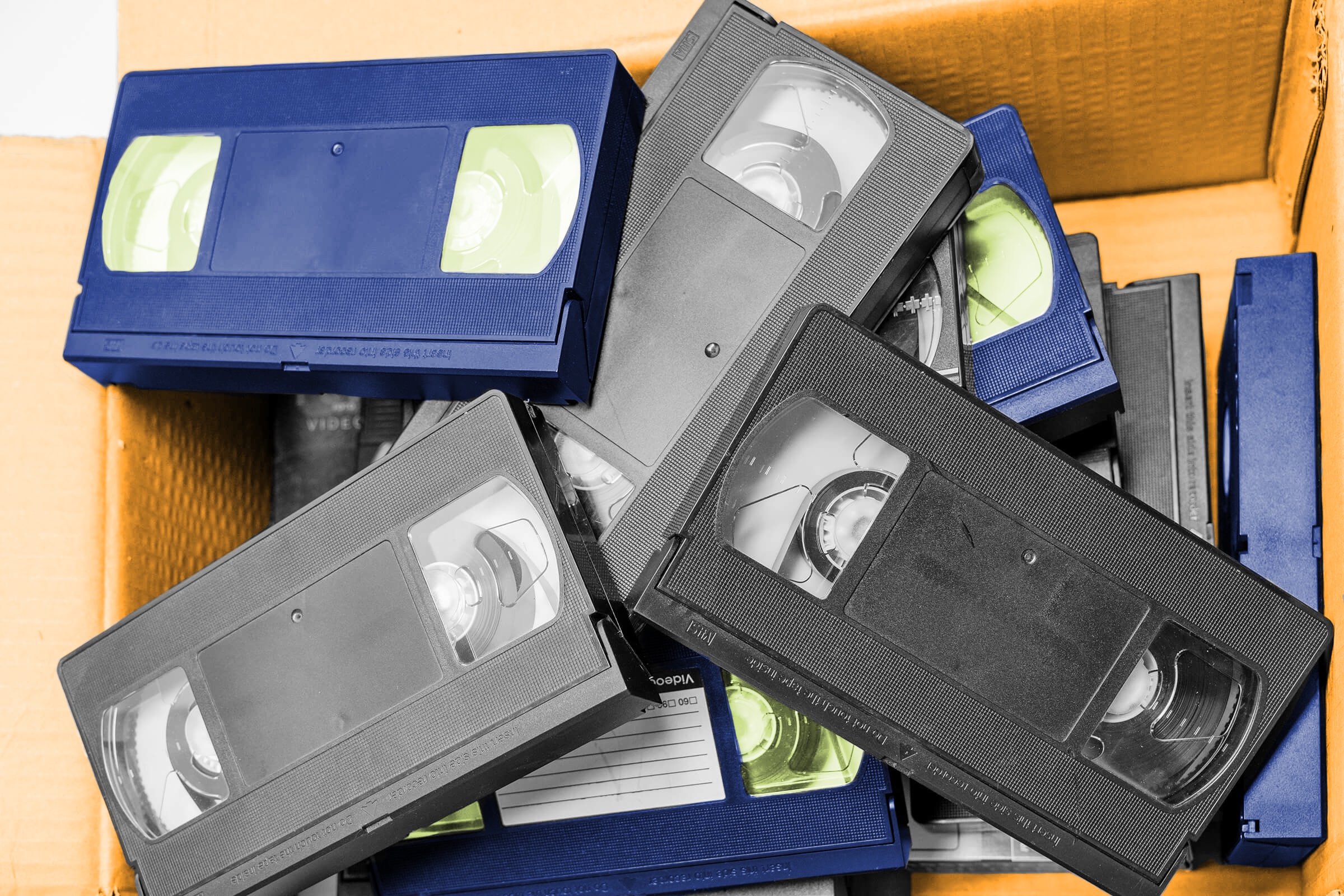 Box full of VHS tapes