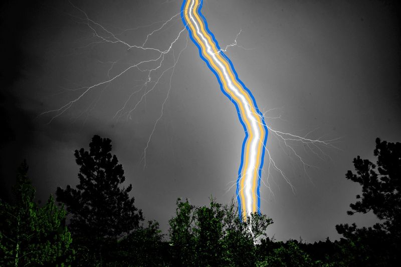 Lightning strikes during strong thunderstorm at night