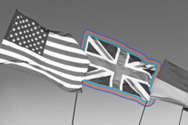 Multiple national flags, including the U.S. and U.K.